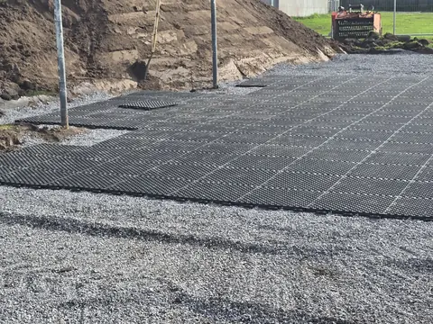 The drainage grid laid across the stone, up to the goalmouth